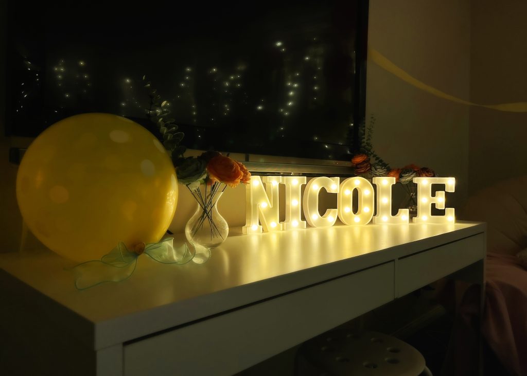 Nicole's Name Lit Up In Lights